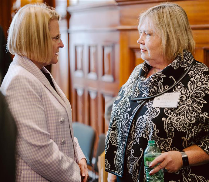 Health Minister Sylvia Jones and OMA CEO Kimberly Moran share a few words at Queen's Park Day 2023.