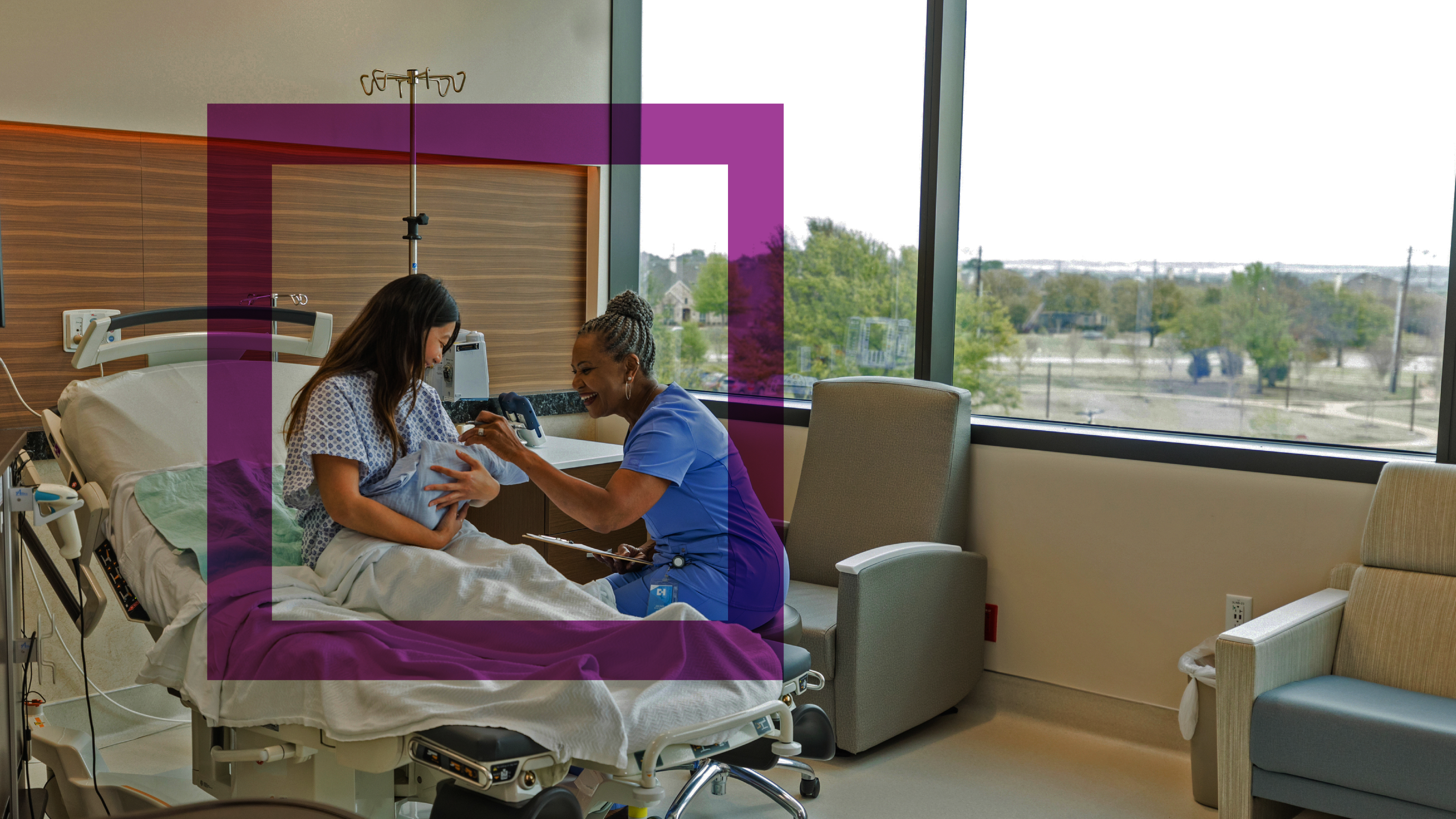 A doctor interacts with a mother and her newborn baby.
